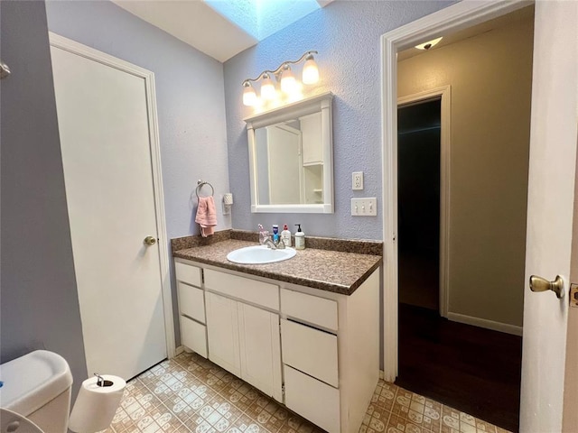 136 Skyline Dr, Chickasha, OK 73018 - bathroom with tile patterned floors and vanity