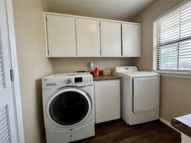 136 Skyline Dr, Chickasha, OK 73018 - clothes washing area with dark wood-style floors, washer and clothes dryer, baseboards, and cabinet space