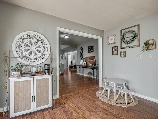 7 Kaross Dr, Shawnee, OK 74801 - hall with wood finished floors and baseboards