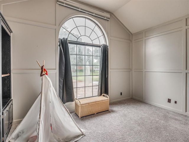 7 Kaross Dr, Shawnee, OK 74801 - carpeted spare room with a decorative wall and lofted ceiling