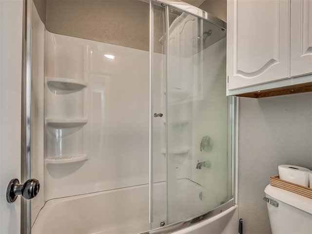 7 Kaross Dr, Shawnee, OK 74801 - bathroom with toilet and bath / shower combo with glass door