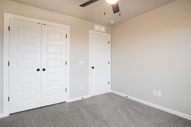 unfurnished bedroom featuring visible vents, baseboards, a closet, ceiling fan, and carpet flooring