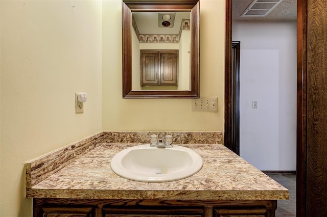 1113 Bank Side Cir, Edmond, OK 73012 - bathroom featuring visible vents and vanity