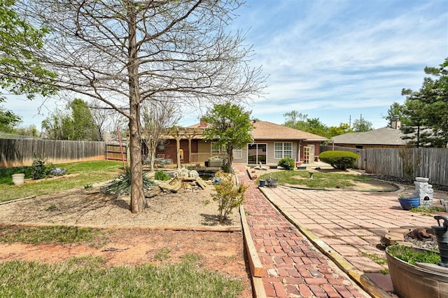1113 Bank Side Cir, Edmond, OK 73012 - rear view of house featuring a fenced backyard and a patio