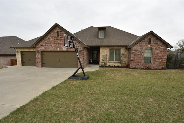 view of front of property with a garage, concrete driveway, brick siding, and a front lawn