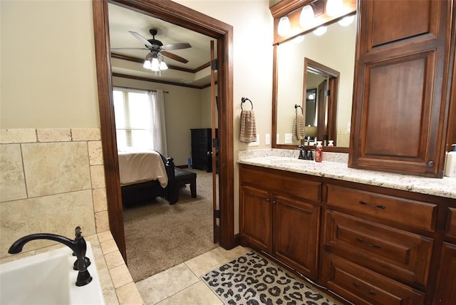 full bath featuring vanity, ensuite bath, ornamental molding, tile patterned flooring, and a ceiling fan