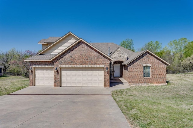 3719 Black Forrest Ct, Newcastle, OK 73065 - view of front of home with a garage, a front yard, brick siding, and driveway