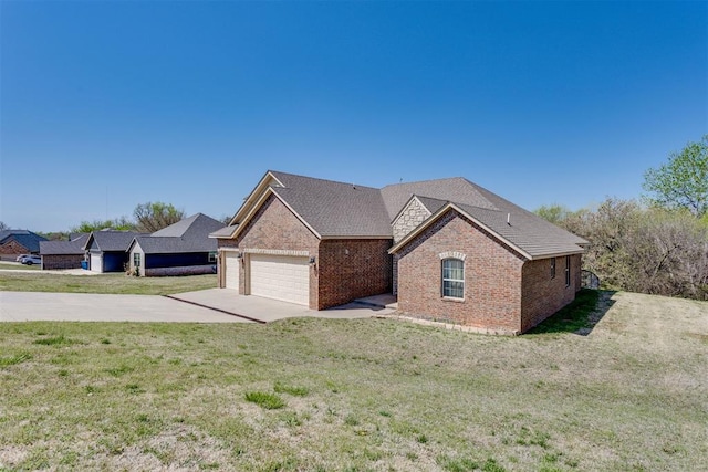 3719 Black Forrest Ct, Newcastle, OK 73065 - view of front of house with an attached garage, concrete driveway, a front lawn, and brick siding