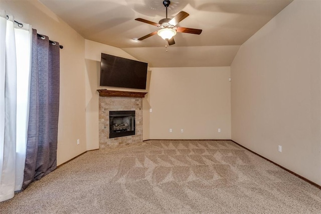 3719 Black Forrest Ct, Newcastle, OK 73065 - unfurnished living room with ceiling fan, carpet floors, a tiled fireplace, lofted ceiling, and baseboards