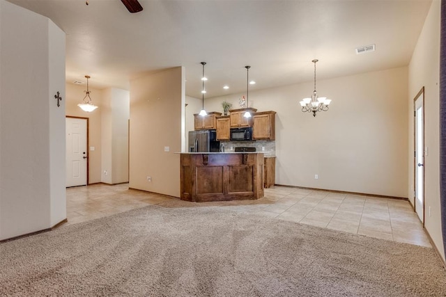 3719 Black Forrest Ct, Newcastle, OK 73065 - kitchen with visible vents, black microwave, stainless steel refrigerator with ice dispenser, and light tile patterned floors