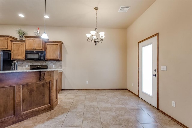 3719 Black Forrest Ct, Newcastle, OK 73065 - kitchen featuring visible vents, a notable chandelier, brown cabinets, black appliances, and decorative backsplash