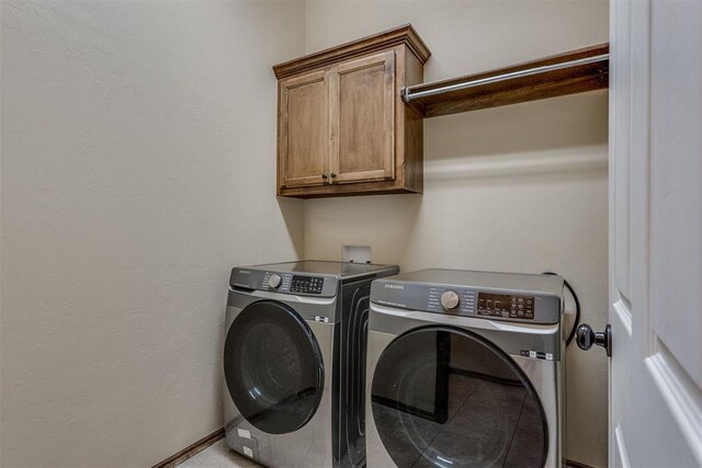 3719 Black Forrest Ct, Newcastle, OK 73065 - laundry room featuring baseboards, cabinet space, and washer and clothes dryer
