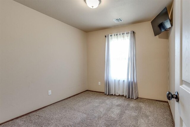3719 Black Forrest Ct, Newcastle, OK 73065 - spare room with visible vents, baseboards, and light colored carpet