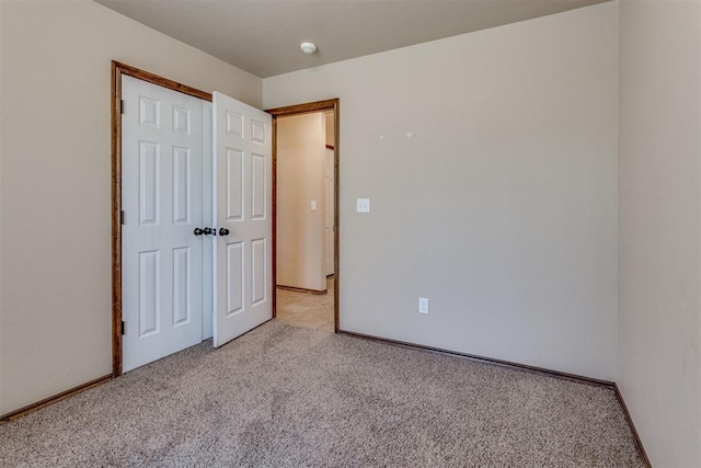 3719 Black Forrest Ct, Newcastle, OK 73065 - unfurnished bedroom with a closet, baseboards, and carpet floors