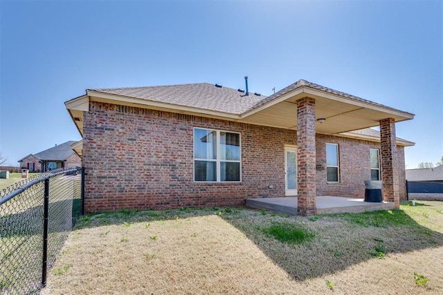 3719 Black Forrest Ct, Newcastle, OK 73065 - rear view of property with brick siding, a patio area, fence, and a lawn