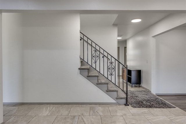 2621 NW 121st St, Oklahoma City, OK 73120 - stairway featuring baseboards