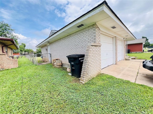 105 SW 6th St, Moore, OK 73160 - view of side of property with brick siding, a garage, and a gate