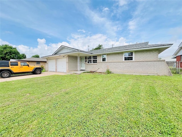105 SW 6th St, Moore, OK 73160 - single story home with an attached garage, brick siding, a front lawn, and driveway