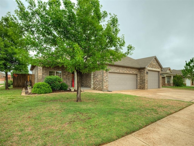 view of front of home with a front lawn, fence, brick siding, an attached garage, and driveway