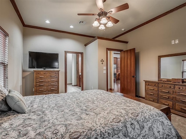 bedroom with crown molding, carpet flooring, ceiling fan, recessed lighting, and visible vents