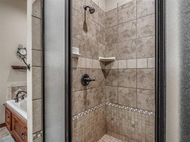 bathroom featuring a shower stall and a garden tub