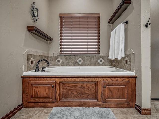 full bath featuring tile patterned flooring and a garden tub