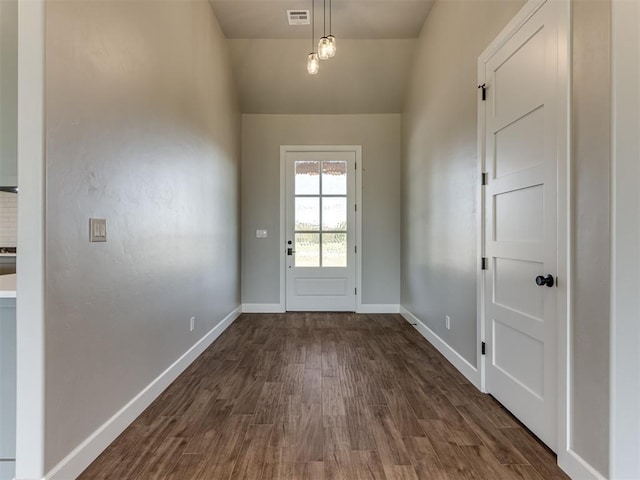 15528 NE 36th St, Choctaw, OK 73020 - entryway featuring dark wood finished floors, baseboards, and visible vents