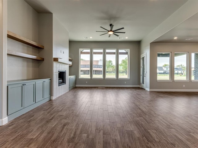 15528 NE 36th St, Choctaw, OK 73020 - unfurnished living room with a fireplace, dark wood finished floors, a ceiling fan, and recessed lighting