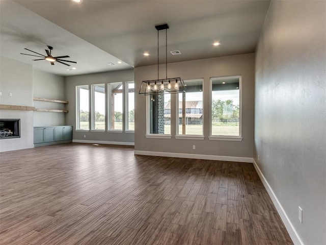 15528 NE 36th St, Choctaw, OK 73020 - unfurnished living room with a ceiling fan, baseboards, a fireplace, and dark wood finished floors