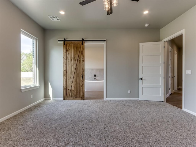 15528 NE 36th St, Choctaw, OK 73020 - unfurnished bedroom with carpet, visible vents, and baseboards