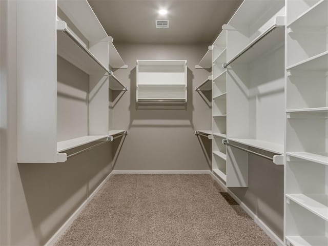 15528 NE 36th St, Choctaw, OK 73020 - walk in closet with visible vents and carpet flooring