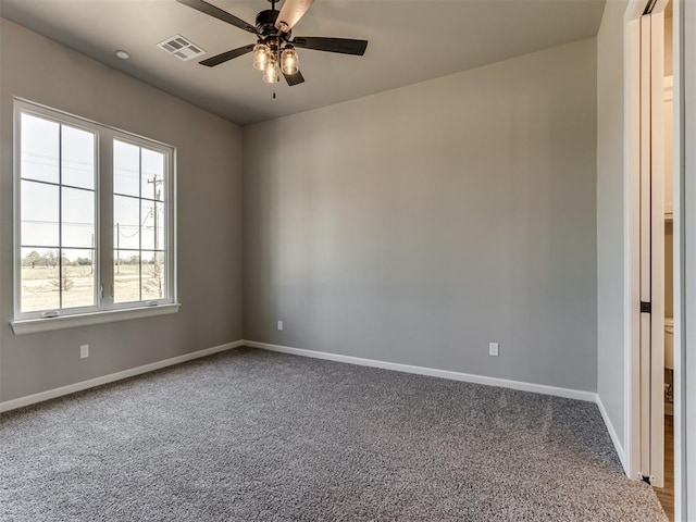 15528 NE 36th St, Choctaw, OK 73020 - carpeted empty room featuring visible vents, a ceiling fan, baseboards, and a healthy amount of sunlight
