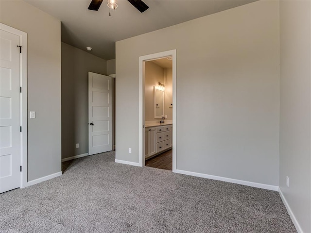 15528 NE 36th St, Choctaw, OK 73020 - unfurnished bedroom with ensuite bath, baseboards, a ceiling fan, and carpet