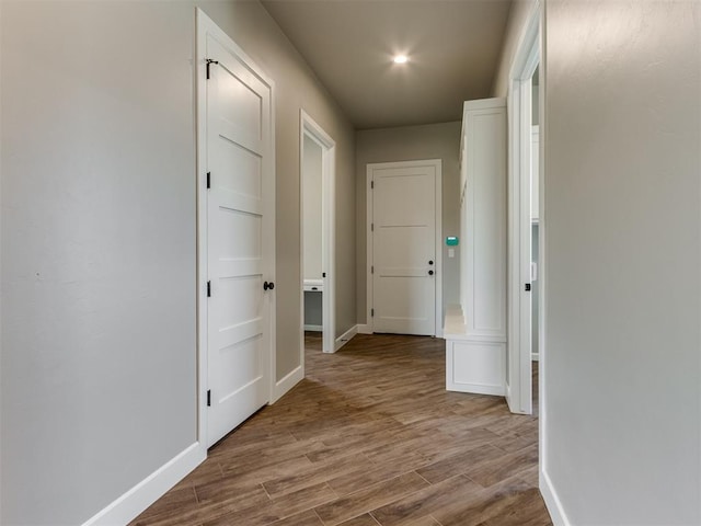 15528 NE 36th St, Choctaw, OK 73020 - hall featuring recessed lighting, wood finished floors, and baseboards