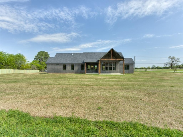 15528 NE 36th St, Choctaw, OK 73020 - rear view of house featuring fence and a yard