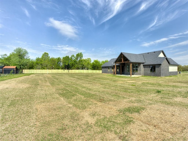 15528 NE 36th St, Choctaw, OK 73020 - view of yard with fence and a patio area