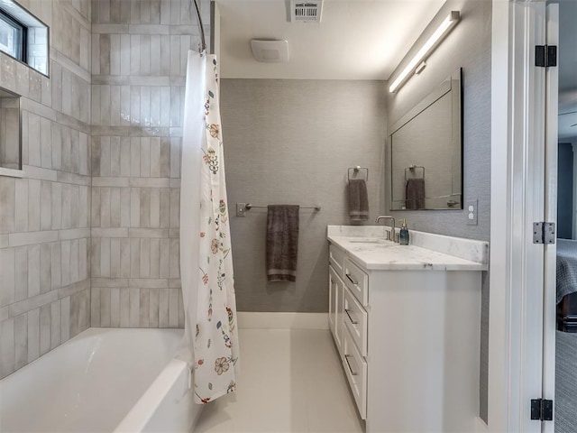 2320 Belleview Dr, Oklahoma City, OK 73112 - bathroom featuring vanity, visible vents, and shower / bathtub combination with curtain