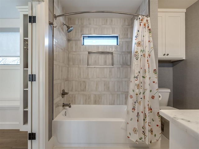 2320 Belleview Dr, Oklahoma City, OK 73112 - bathroom featuring toilet and shower / bathtub combination with curtain
