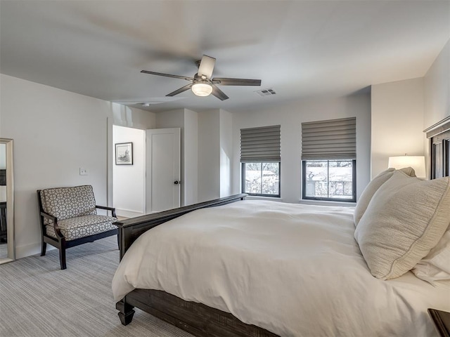 2320 Belleview Dr, Oklahoma City, OK 73112 - bedroom with visible vents, ceiling fan, and light carpet
