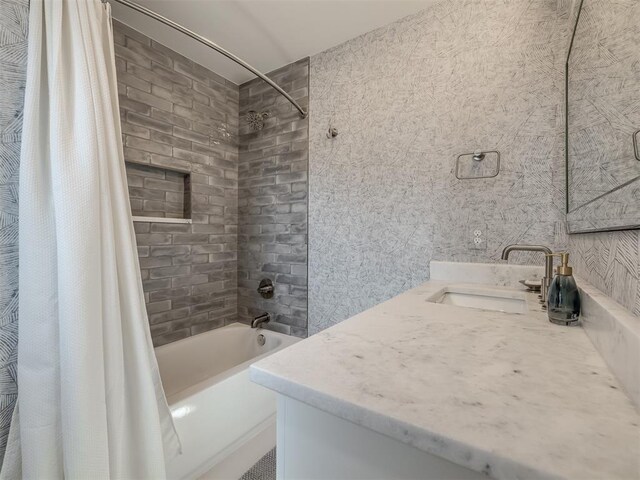 2320 Belleview Dr, Oklahoma City, OK 73112 - bathroom with shower / tub combo with curtain and vanity