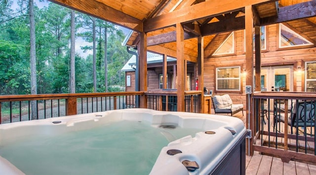 deck with a hot tub