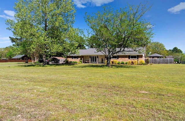 view of yard featuring fence