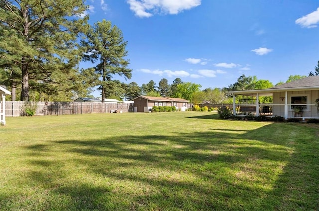 view of yard featuring fence