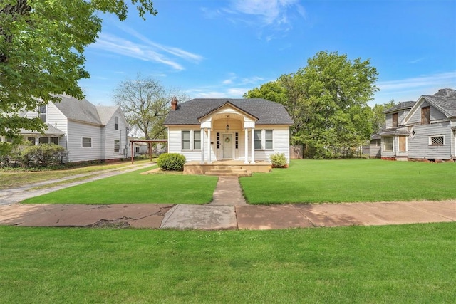 121 S Randlett St, Hobart, OK 73651 - bungalow-style home featuring a front lawn