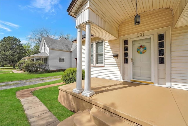121 S Randlett St, Hobart, OK 73651 - property entrance with covered porch and a lawn