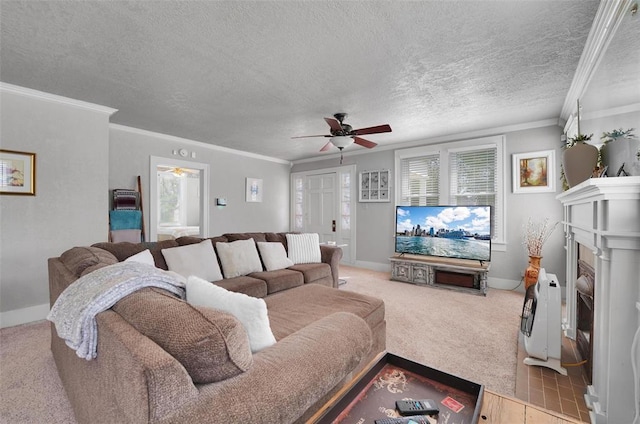 121 S Randlett St, Hobart, OK 73651 - living area featuring carpet, a textured ceiling, a ceiling fan, and crown molding