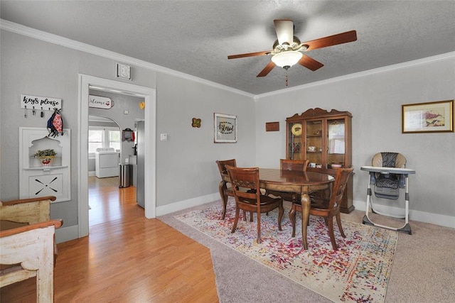 121 S Randlett St, Hobart, OK 73651 - dining space with crown molding, washer / clothes dryer, a ceiling fan, and arched walkways