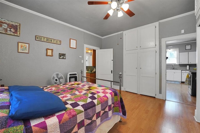 121 S Randlett St, Hobart, OK 73651 - bedroom with light wood-type flooring, crown molding, and a ceiling fan