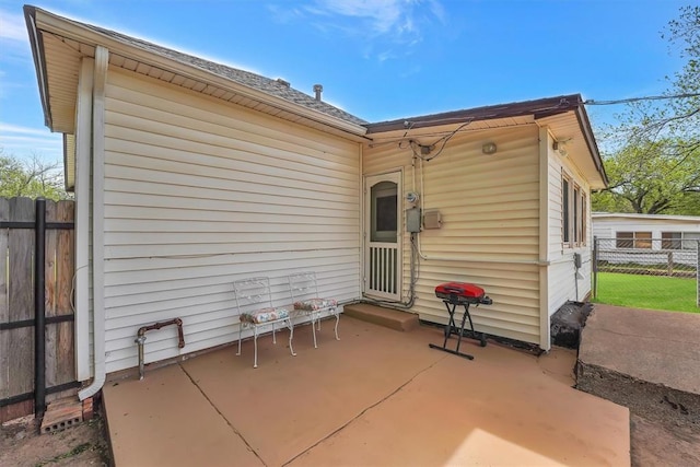 121 S Randlett St, Hobart, OK 73651 - rear view of property featuring fence and a patio