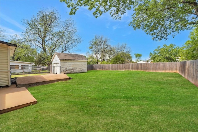 121 S Randlett St, Hobart, OK 73651 - view of yard with a storage shed, a fenced backyard, and an outdoor structure